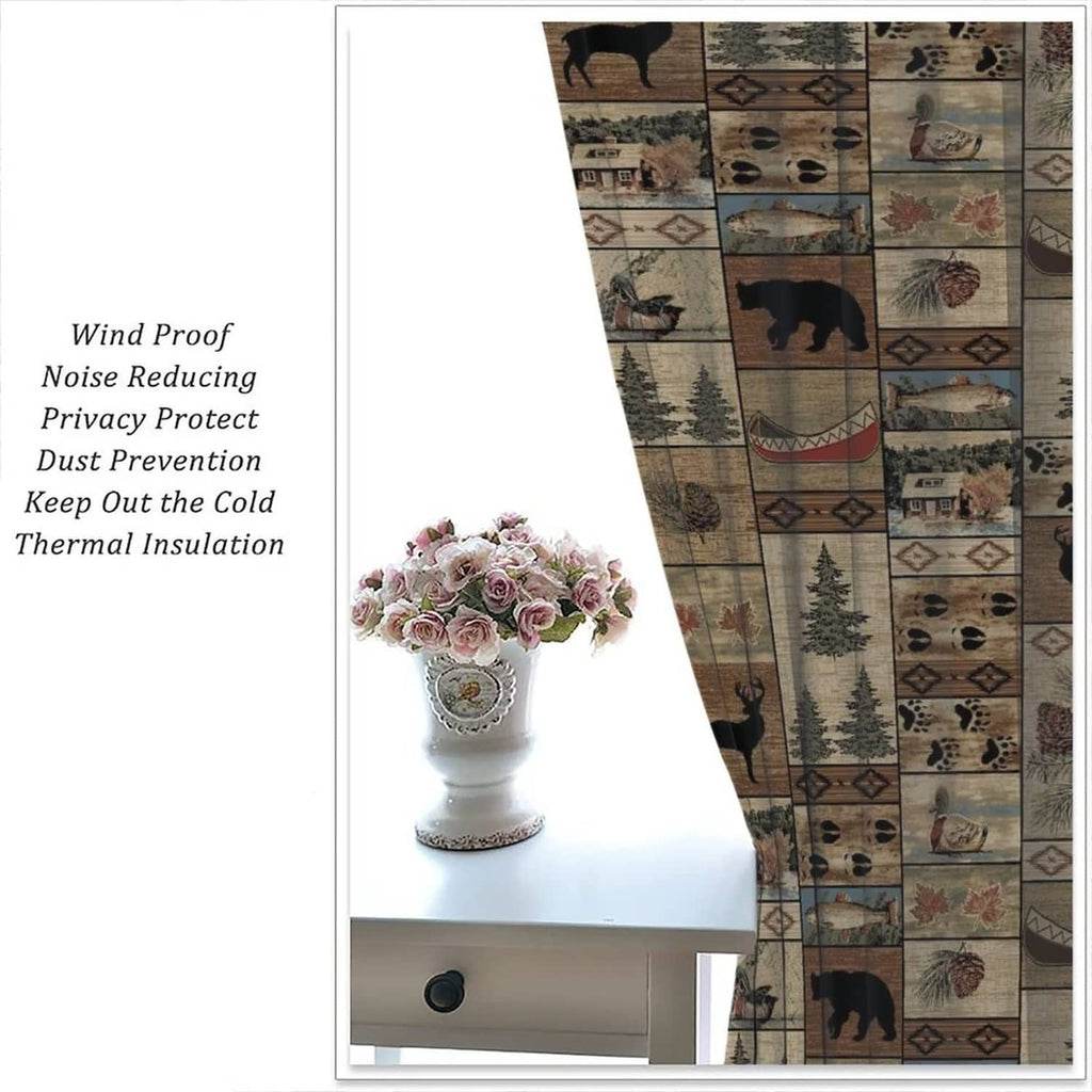 Rustic forest and wildlife print curtain panel with visible bottom edge and folds