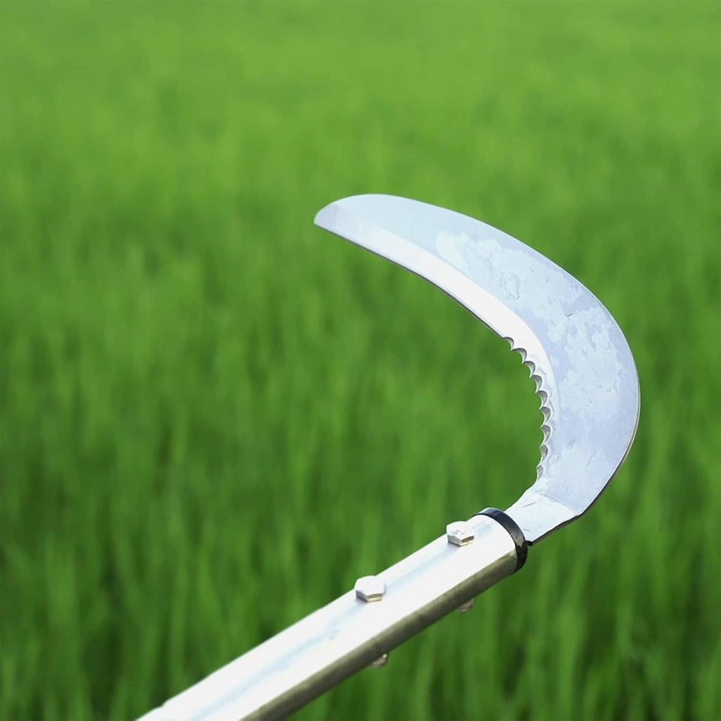 Close-up of curved steel weeding sickle blade with serrated edge