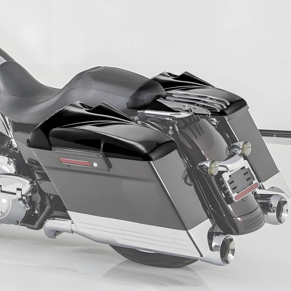 Black speaker lid on motorcycle fairing with vented grille and tweeter opening