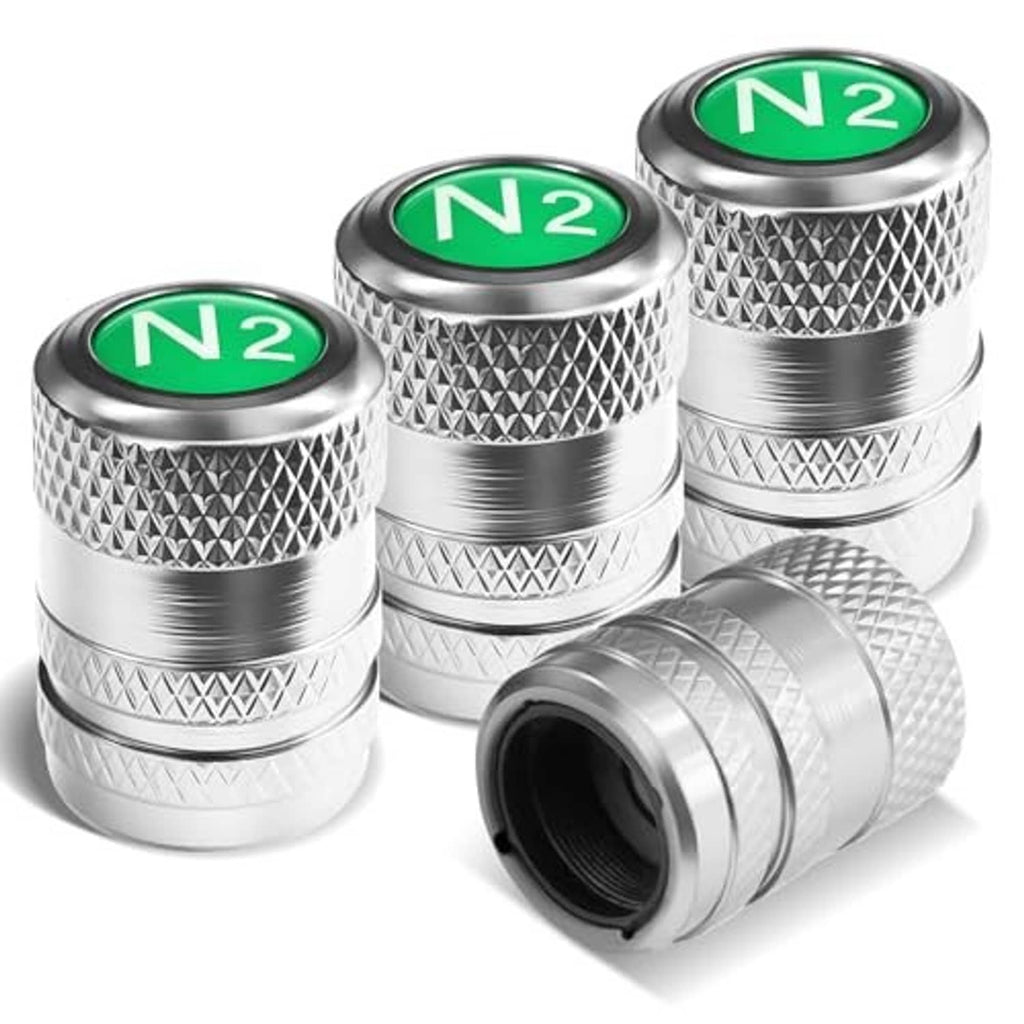 Silver tire valve stem caps with green N2 inserts, textured grip and threaded base (4-pack)