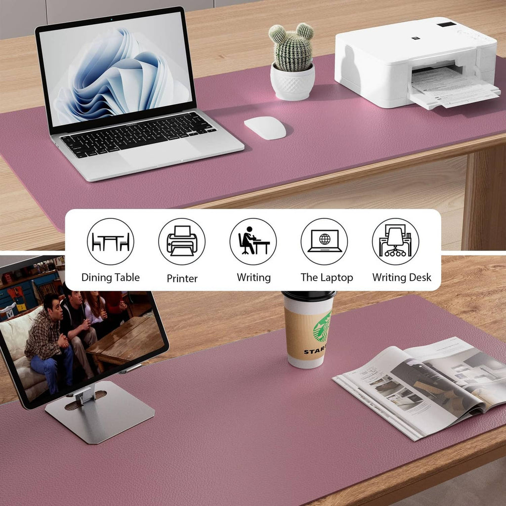 Dark pink leather desk pad on wooden desk with laptop, mouse, and stationery