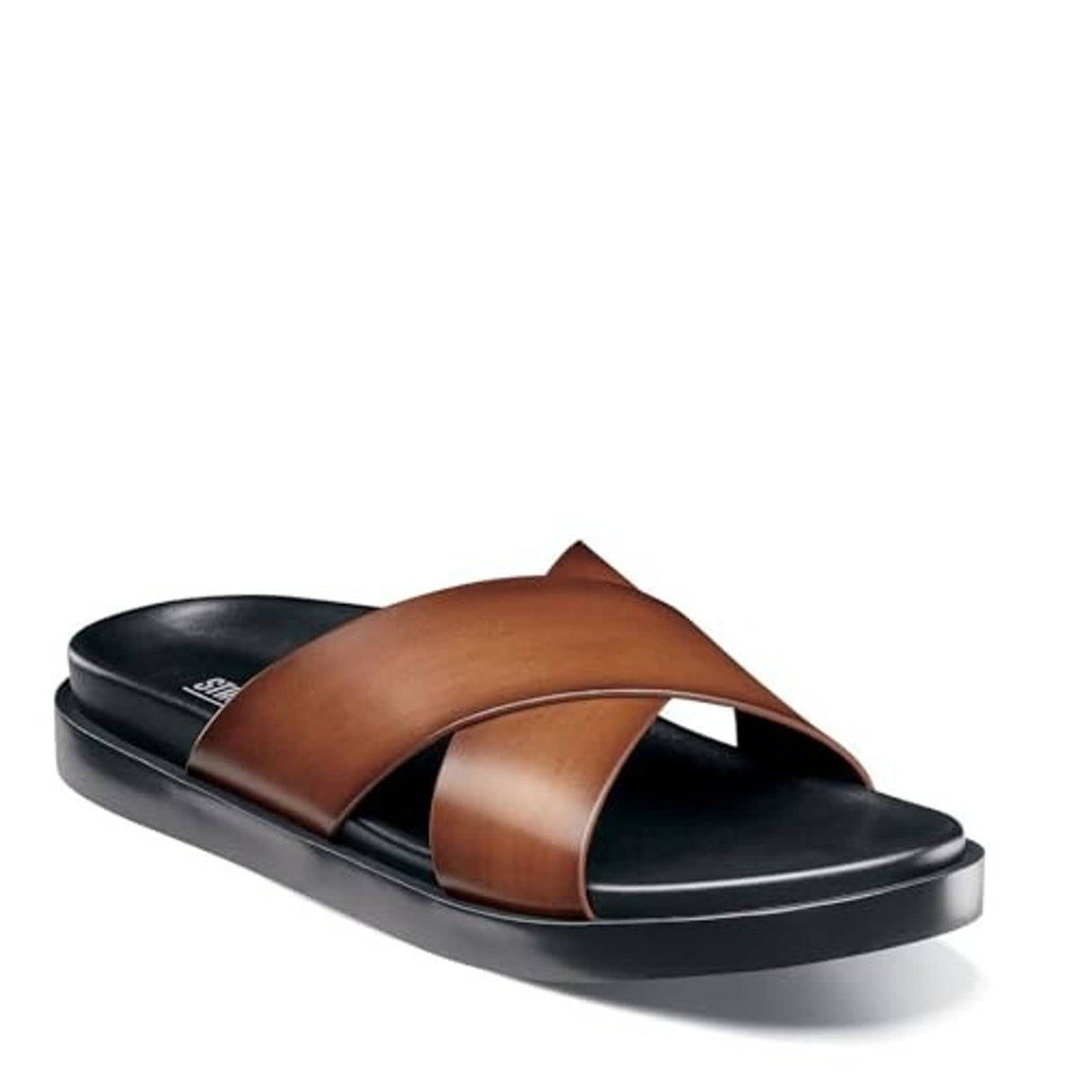 Cognac brown cross-strap slide sandal with open toe and black platform sole