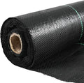 Rolled black woven landscape weed barrier fabric with green edge stitching