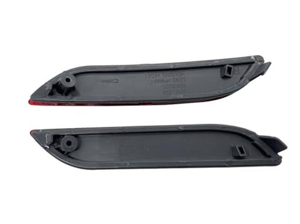 Black rear bumper reflector housings with red reflector edges