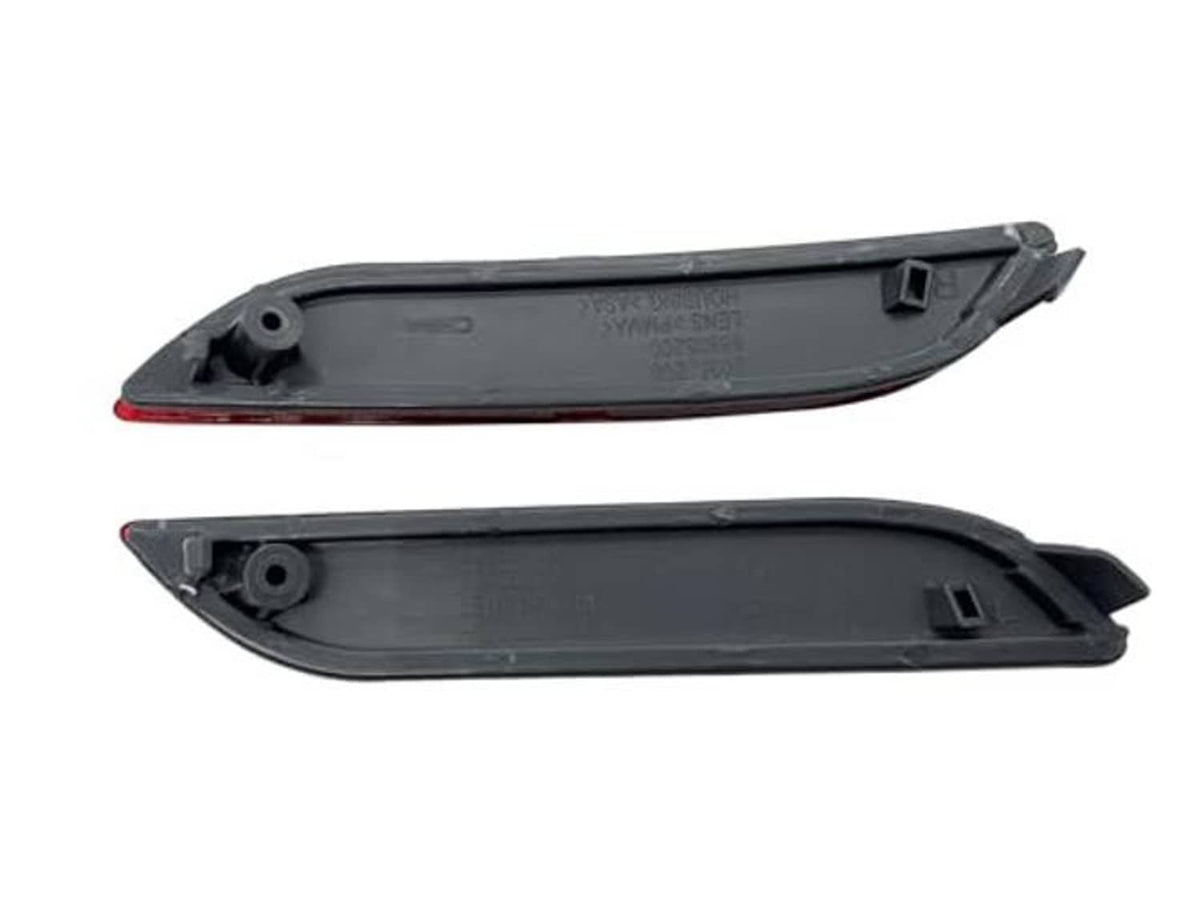 Black rear bumper reflector housings with red reflector edges