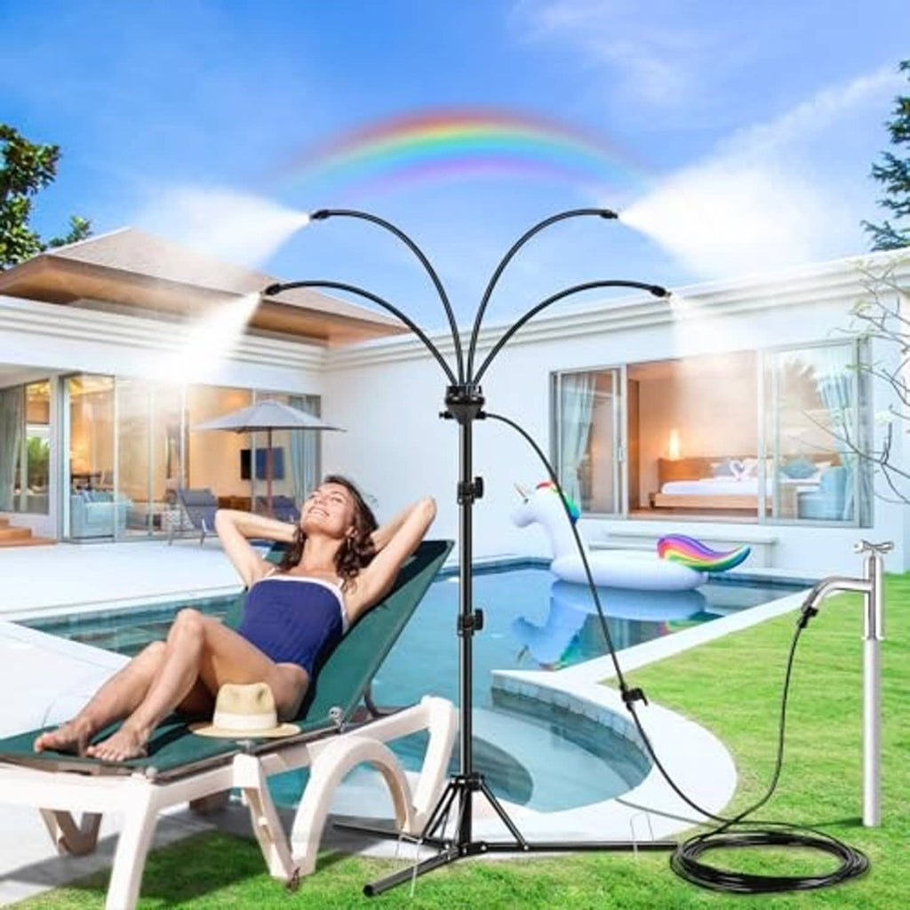Black outdoor misting stand with curved spray arms and coiled hose at base