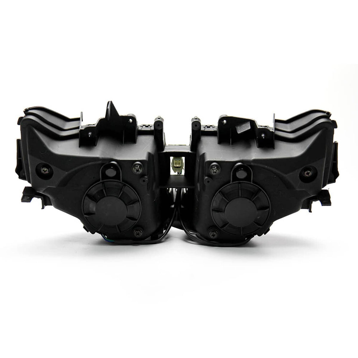 Black dual headlight housings with circular back covers and mounting points