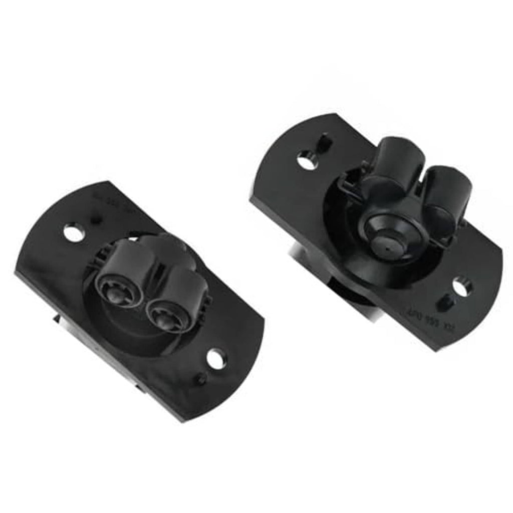 Two black headlight washer nozzle bases with circular nozzles and mounting holes
