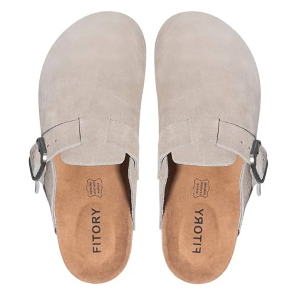 Pair of taupe suede mule clogs with metal buckles and tan insoles