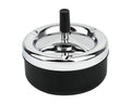 Round black metal ashtray with spinning tray and upright cigarette holder