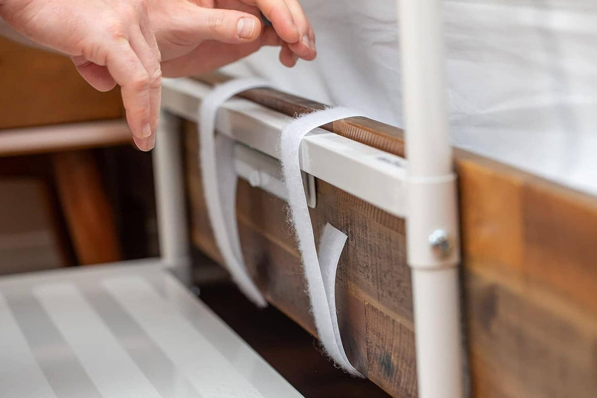Close-up of bed step stool strap securing the stool to the bed frame for safety