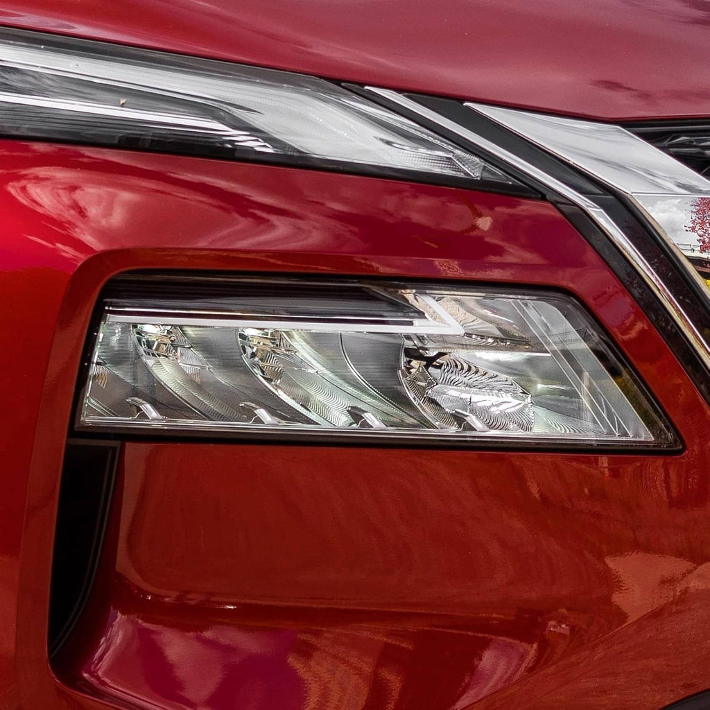 Right LED headlight on red vehicle body, clear lens with chrome reflector