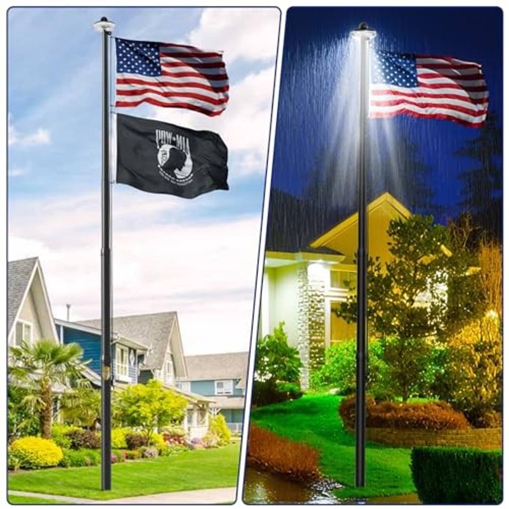 Black outdoor flag pole with solar light top and waving flags in rain spray
