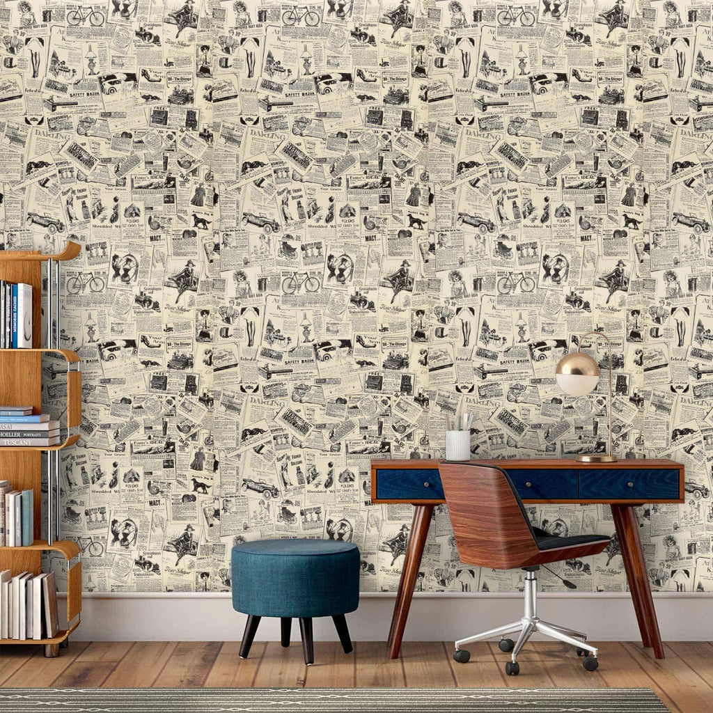 Newspaper-pattern wallpaper on an interior wall with desk, chair, and bookshelves