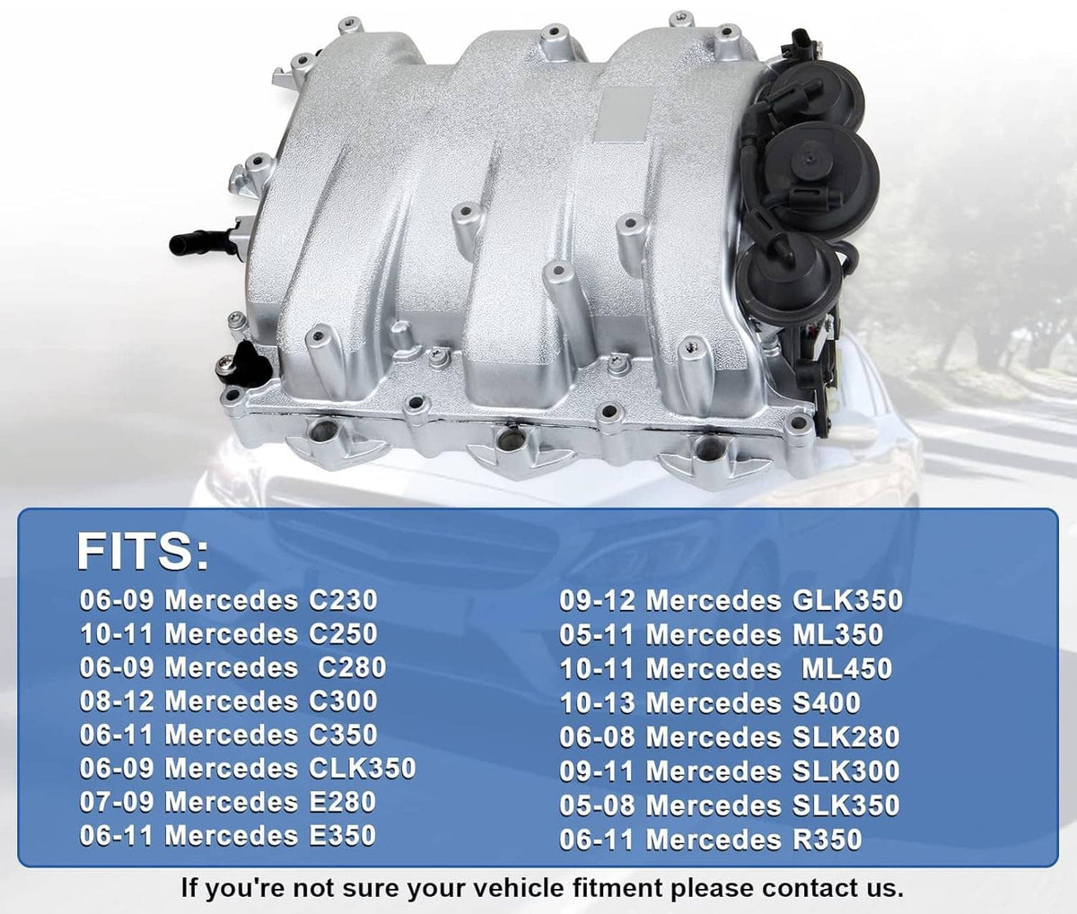 Silver intake manifold with black hoses and electronic sensors, side view