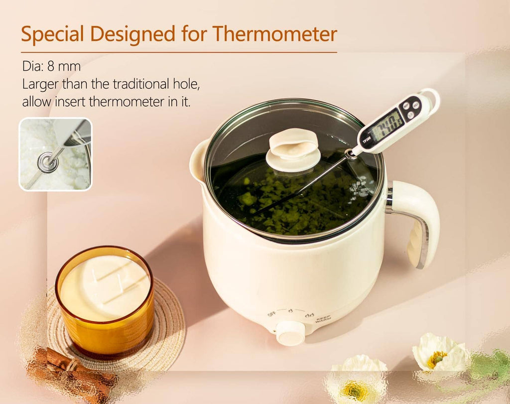 Electric wax melting pot with lid open and thermometer slot