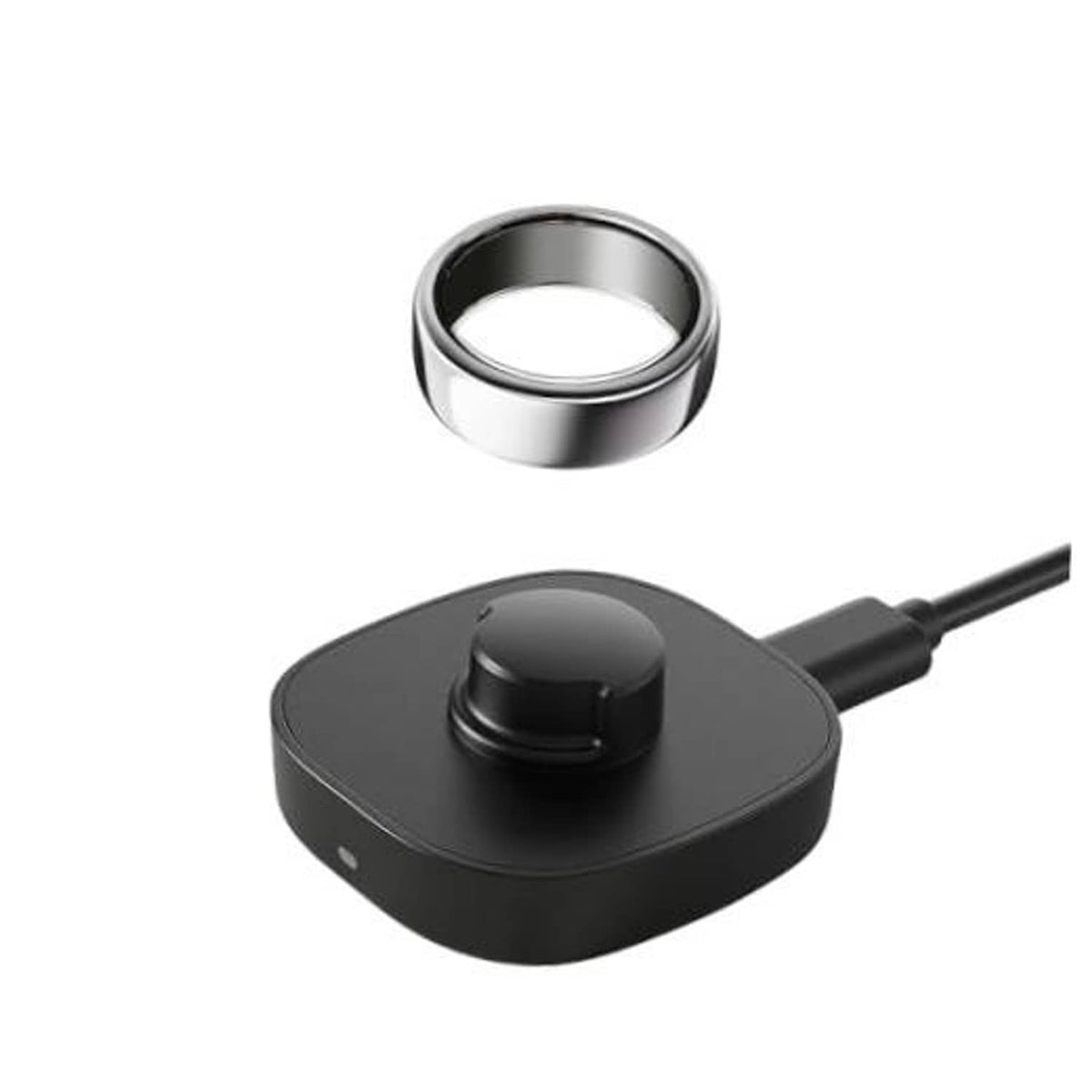 Black Oura Gen3 charging dock with metal ring top and cable