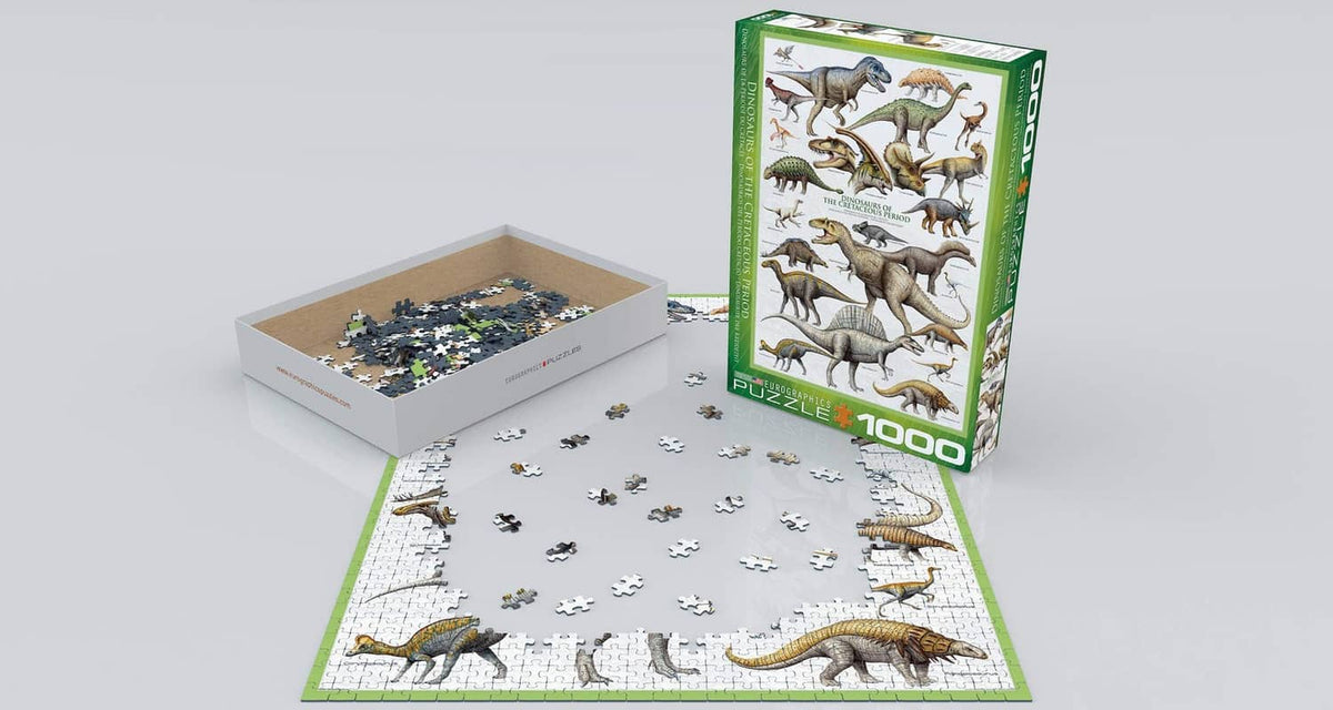 Eurographics dinosaur 1000-piece puzzle with box, loose pieces, and puzzle sheet
