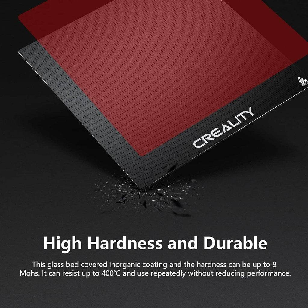 Creality glass bed platform with red square print surface and logo, angled