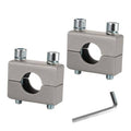Set of silver handlebar clamp risers with two blocks, bolts, and Allen wrench