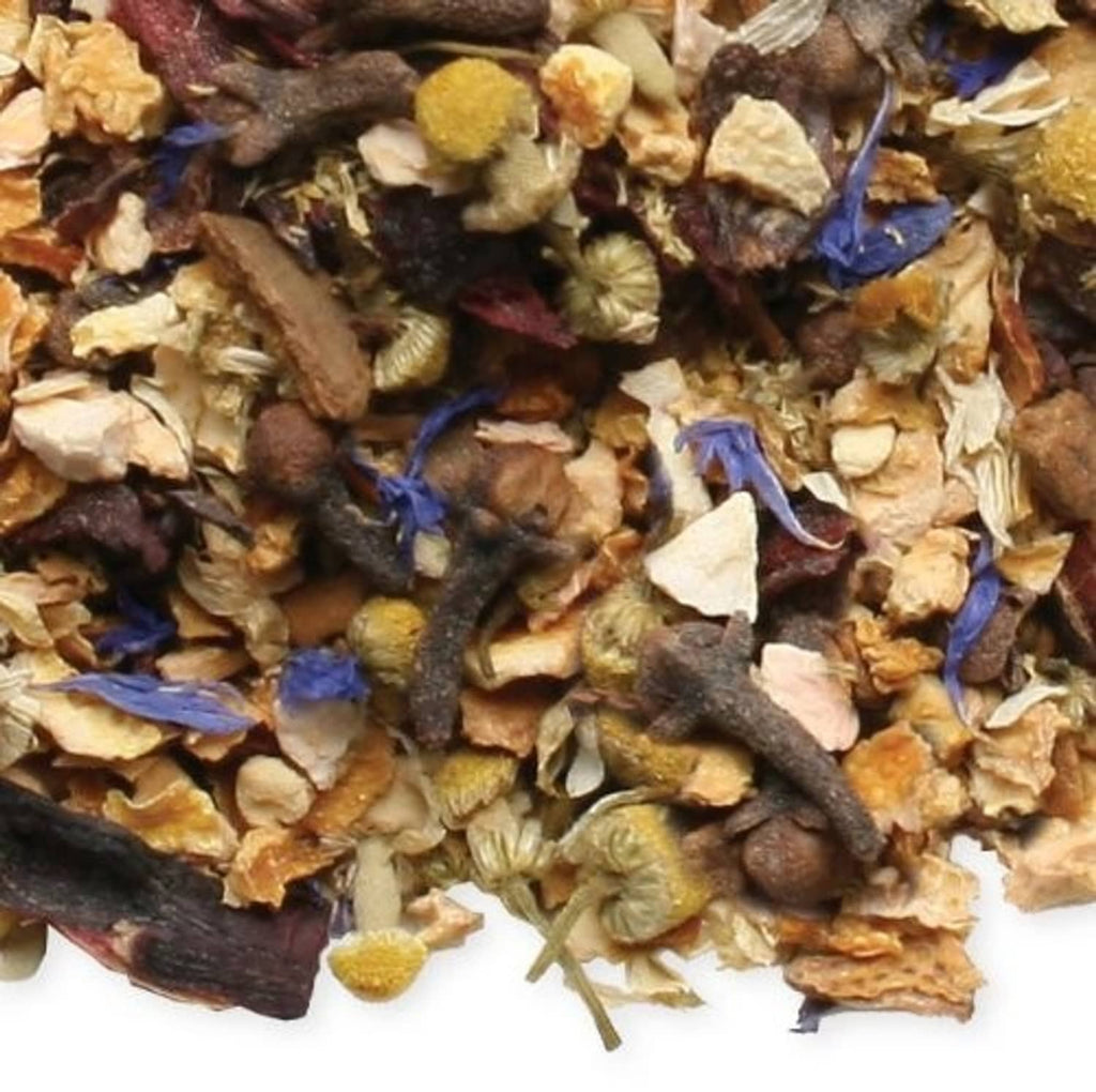 Close-up of dried herbal tea leaves with blue petals and small yellow fragments.