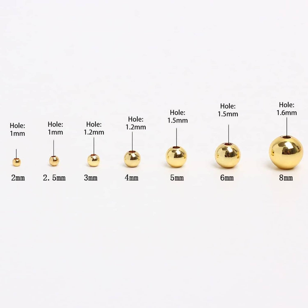 Assorted 14K rose gold filled rondel beads shown by hole size, 1mm to 1.6mm