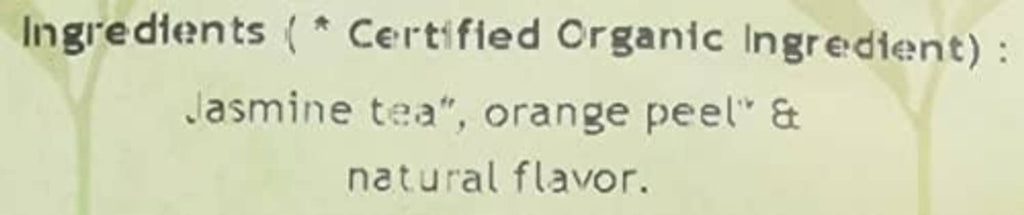 Tea pouch ingredients close-up: jasmine tea, orange peel, and natural flavor