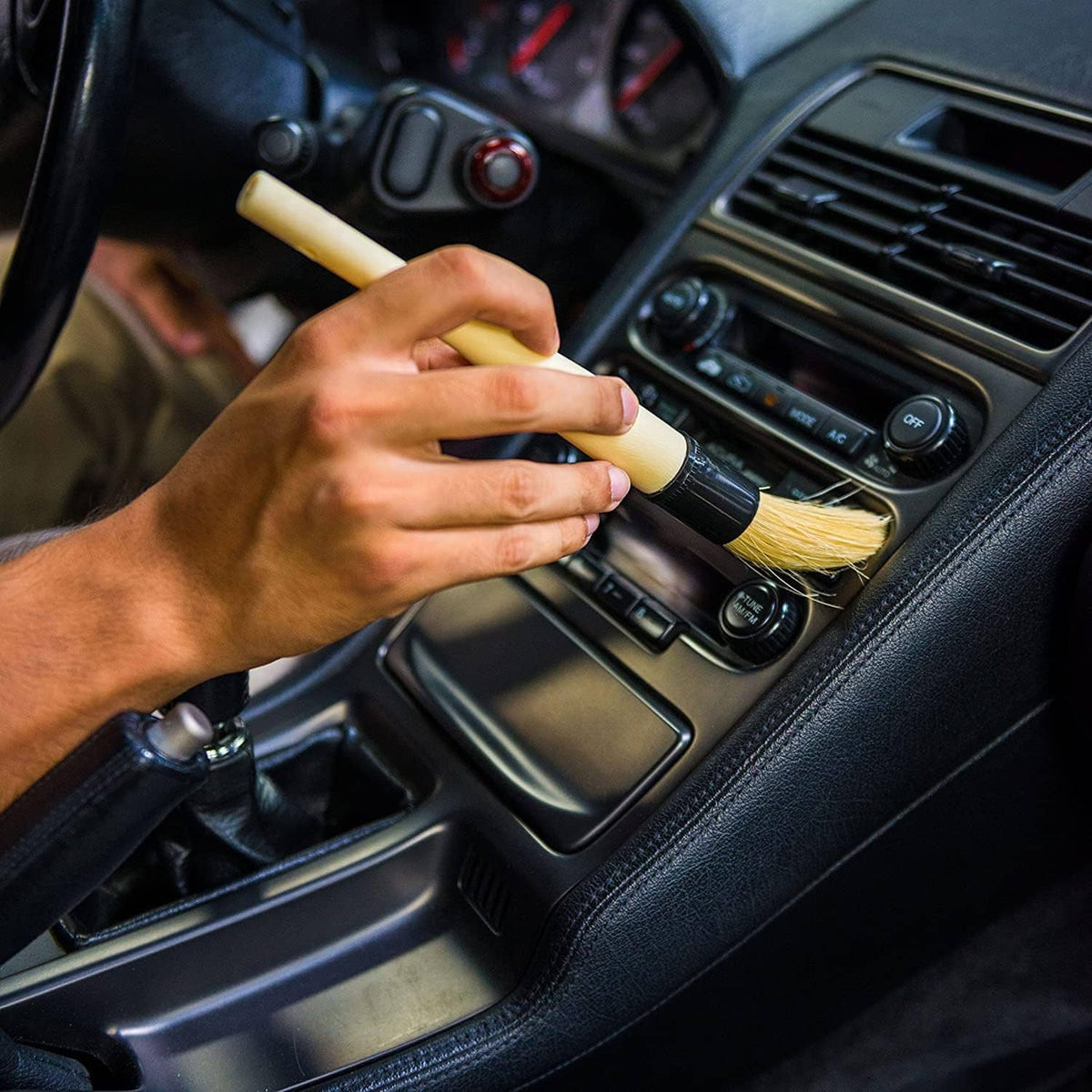 Boar hair brush cleaning vehicle dashboard controls