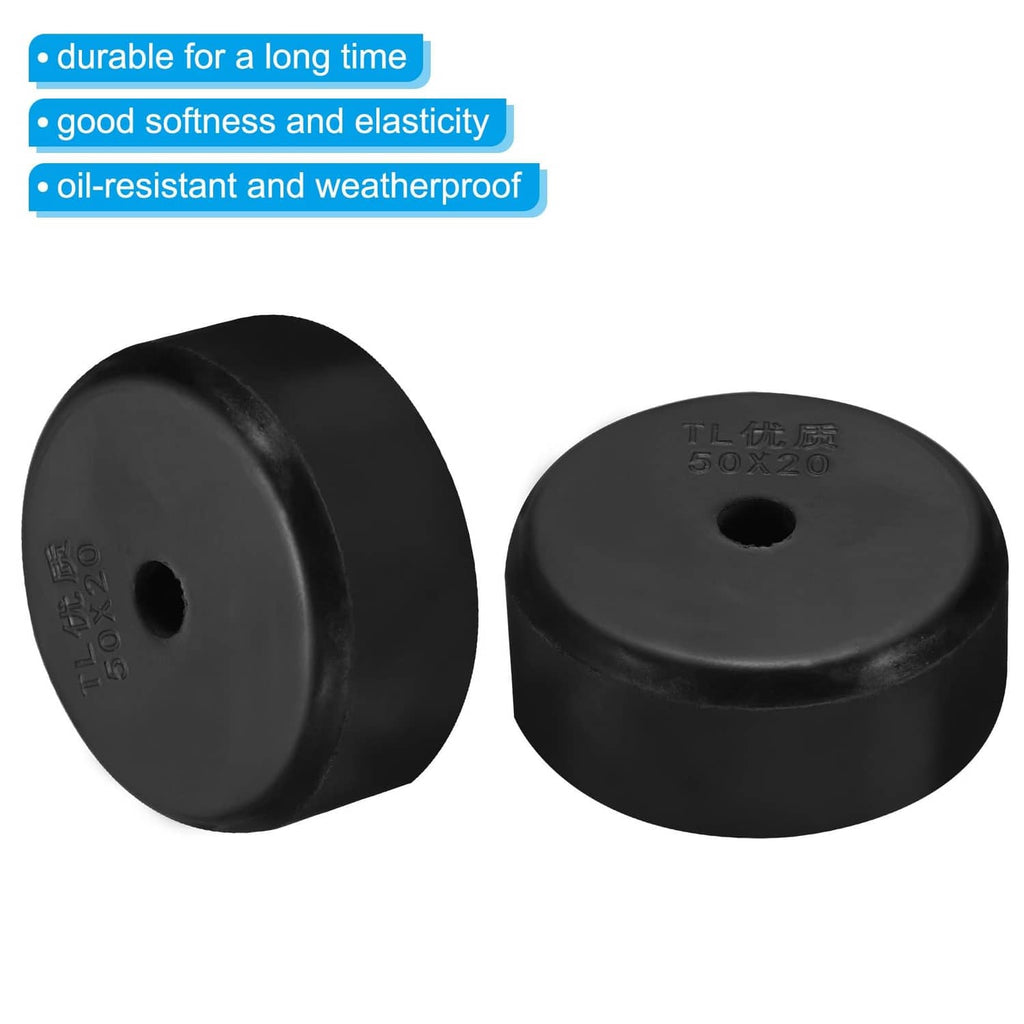 Black rubber spacer pair with stamped top and center holes, round discs