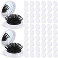 Set of mini folding hair brushes with mirrors, white cases with black bristles