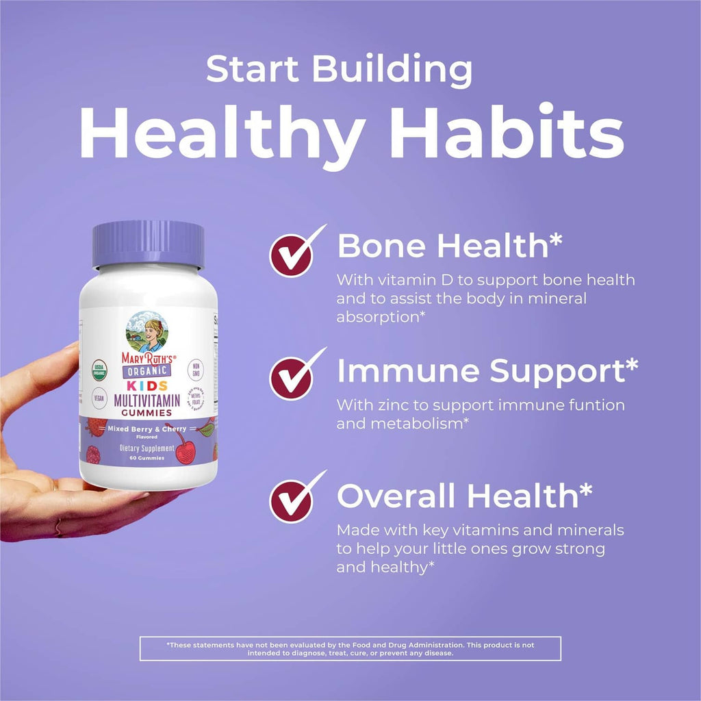 Hand holding Organic Kids multivitamin gummies bottle with healthy habits icons