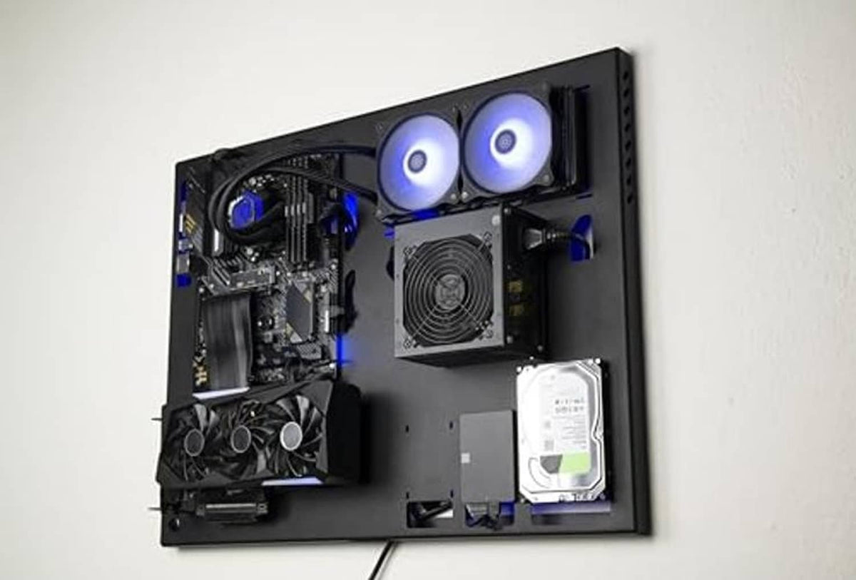 Wall-mounted gaming PC case, black interior with two blue-ring fans and PSU