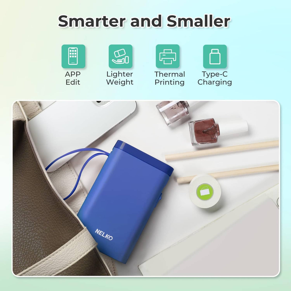 Compact blue label maker with wrist strap and Type-C charging port detail