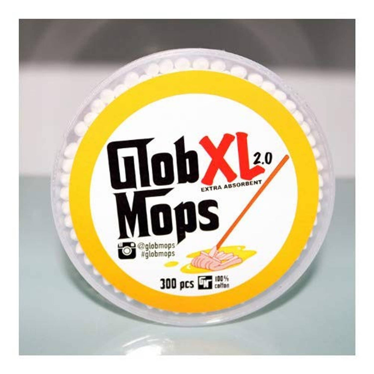Glob XL 2.0 cotton swabs roll with top label on clear plastic lid