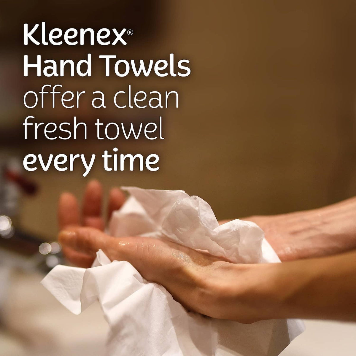 Kleenex hand towel sheet in use, white disposable paper towel