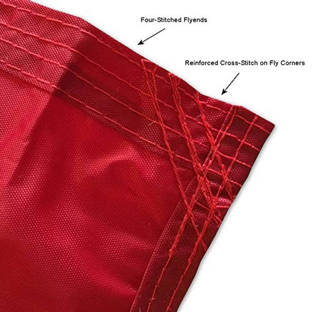 Reinforced American flag fly corner with cross-stitch detail on red fabric
