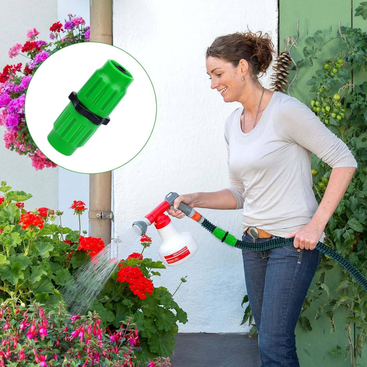Green expandable hose repair connector on a garden hose while watering flowers