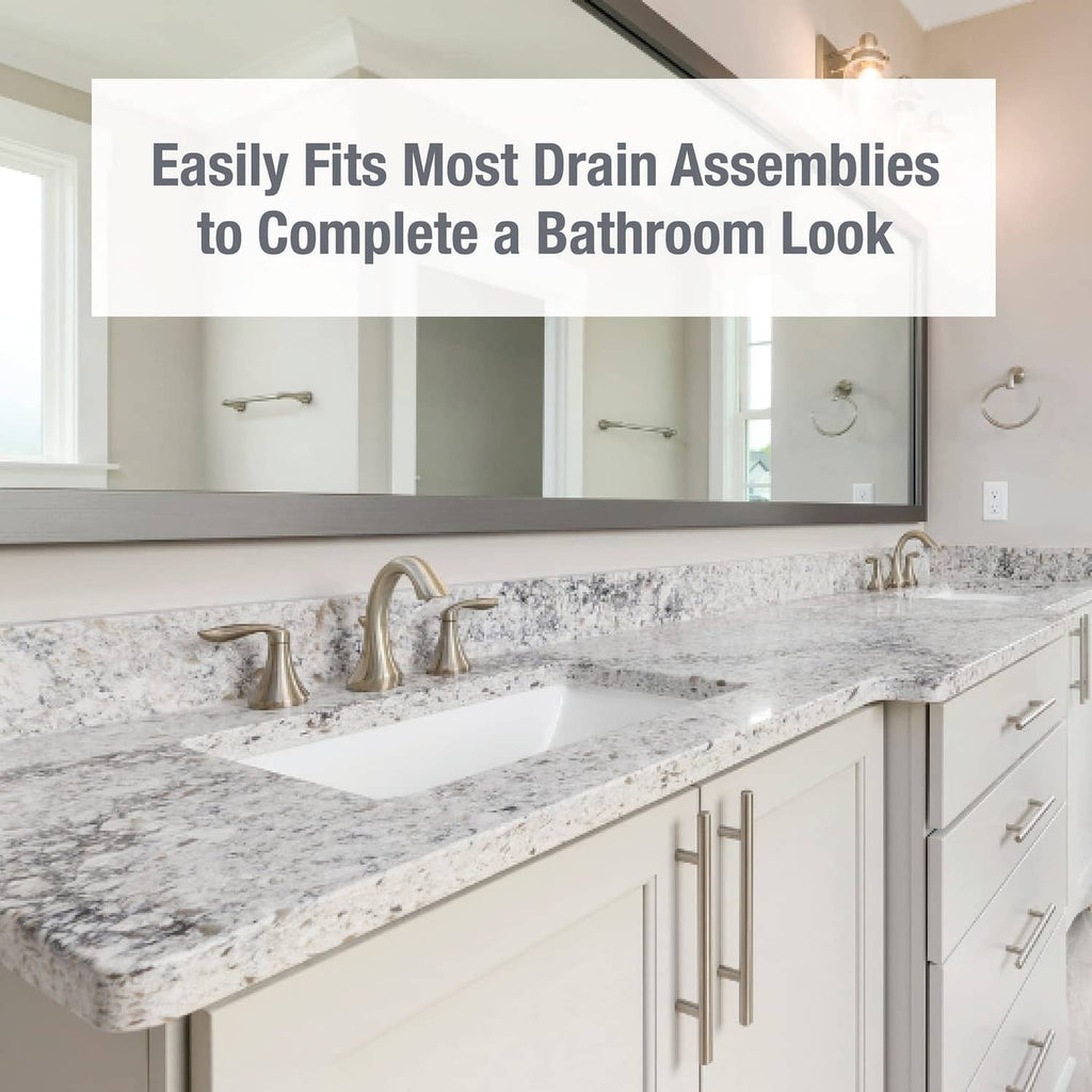 Bathroom sink with installed pop-up drain stopper and brushed nickel finish