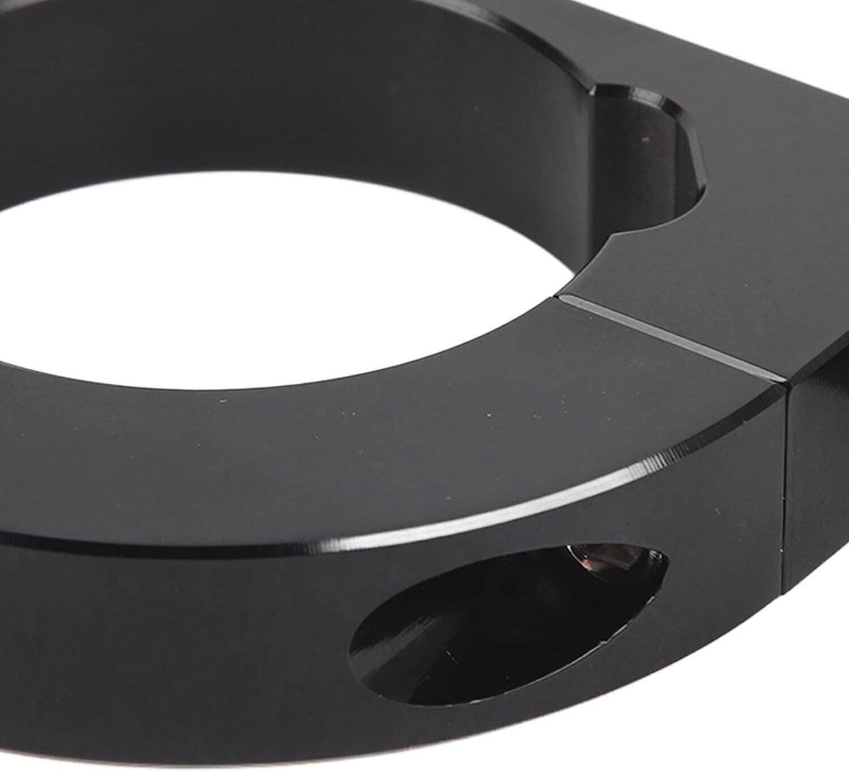 Black steering column mounting bracket with large curved opening and recessed side cutout.