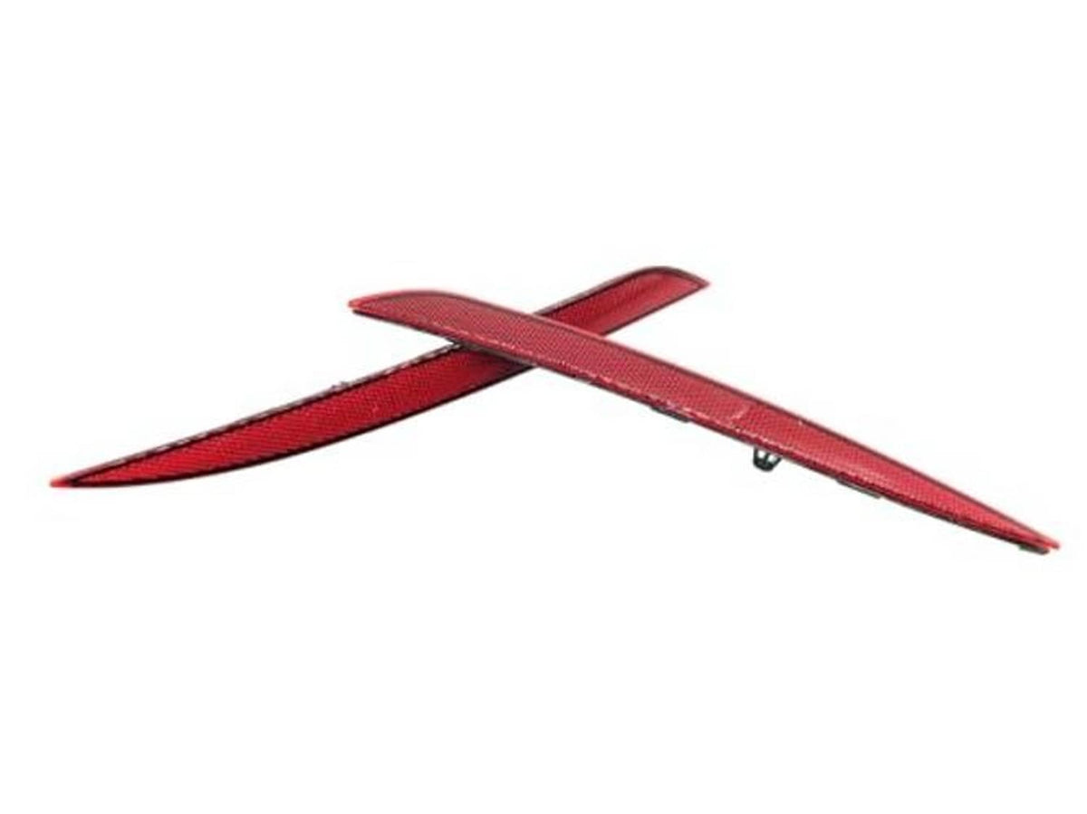 Red rear bumper reflector lens pieces with black mounting backing