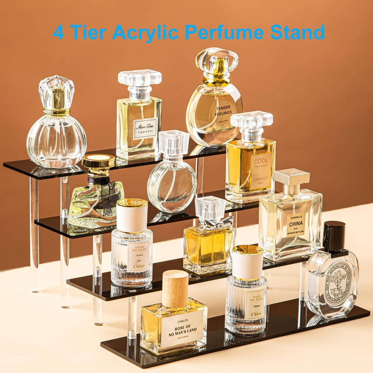 4-tier acrylic display stand with black shelves holding perfume bottles