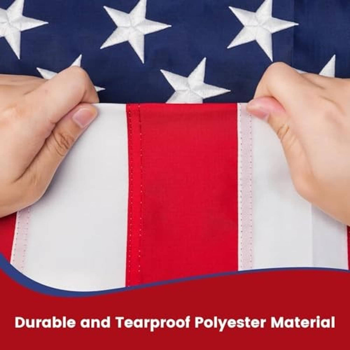 American flag stripes held by hands, showing reinforced hem and stitch lines