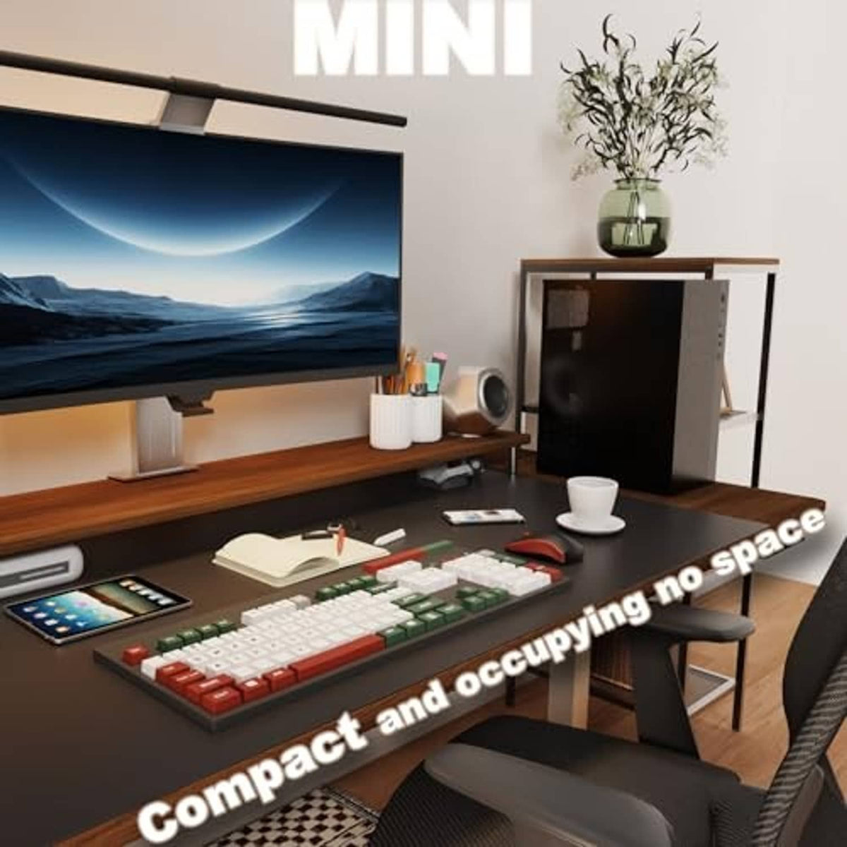 Compact black PC tower case on a desk under a monitor beside a keyboard
