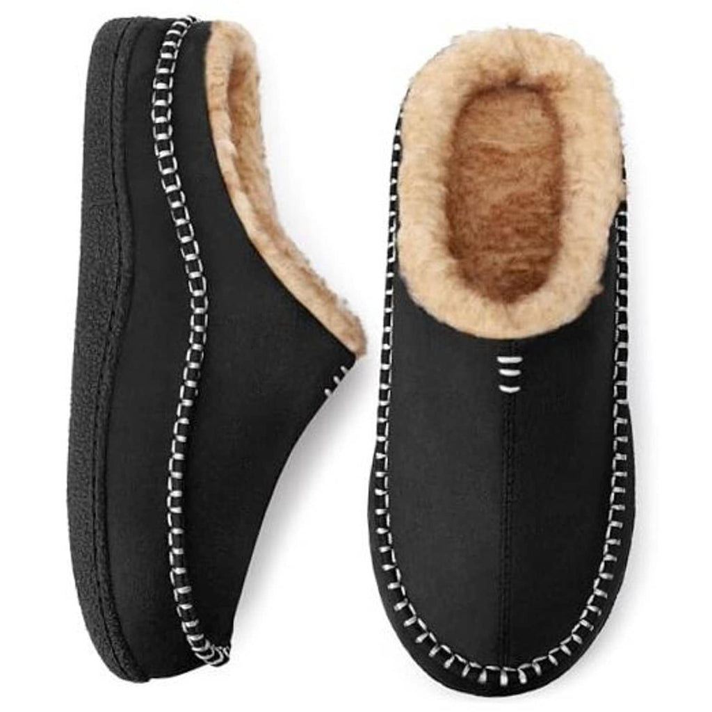 Pair of black slip-on slippers with tan fuzzy lining and white stitched trim.