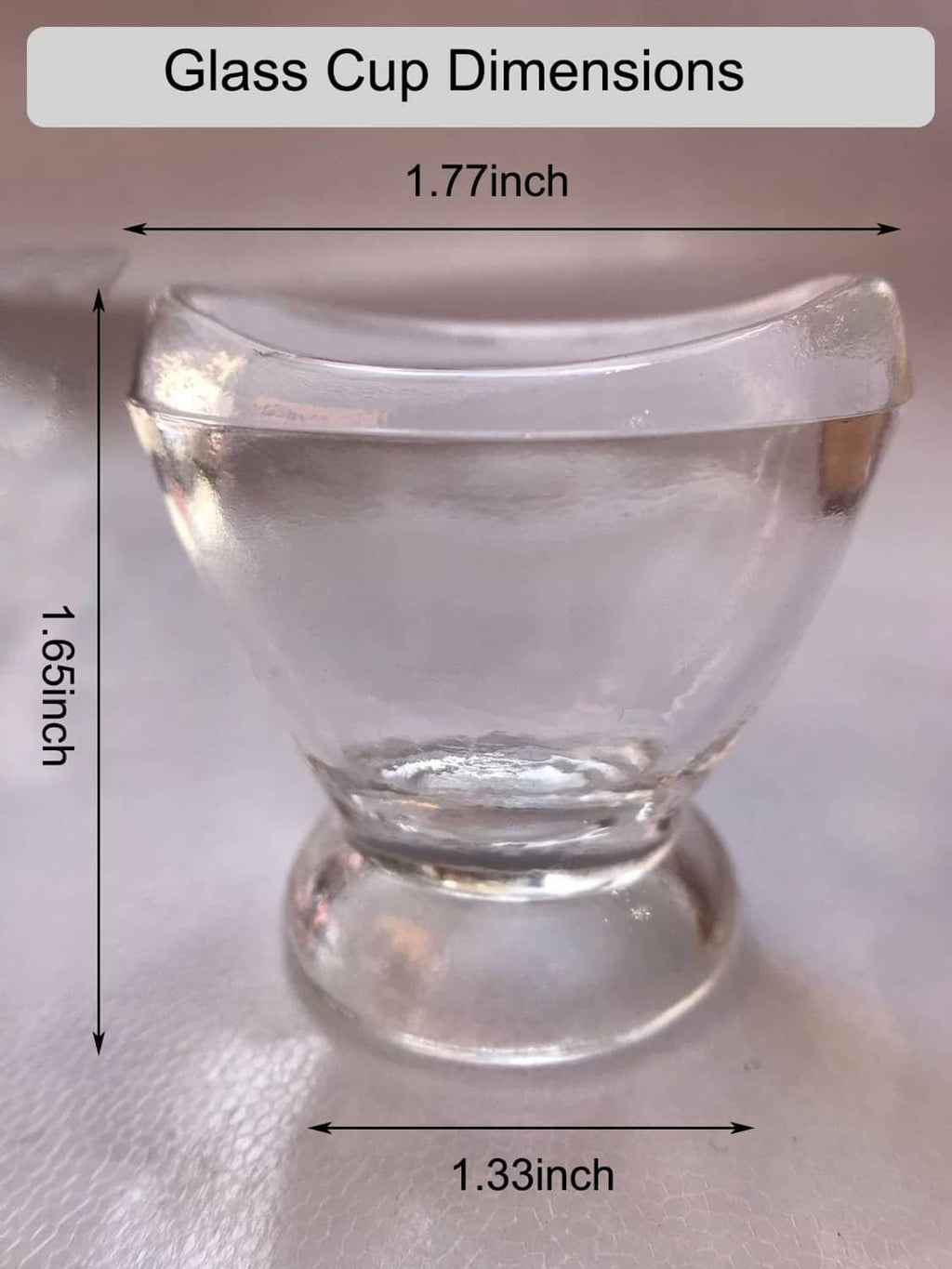 Clear glass eye rinse cup size diagram, 1.77 in by 1.33 in