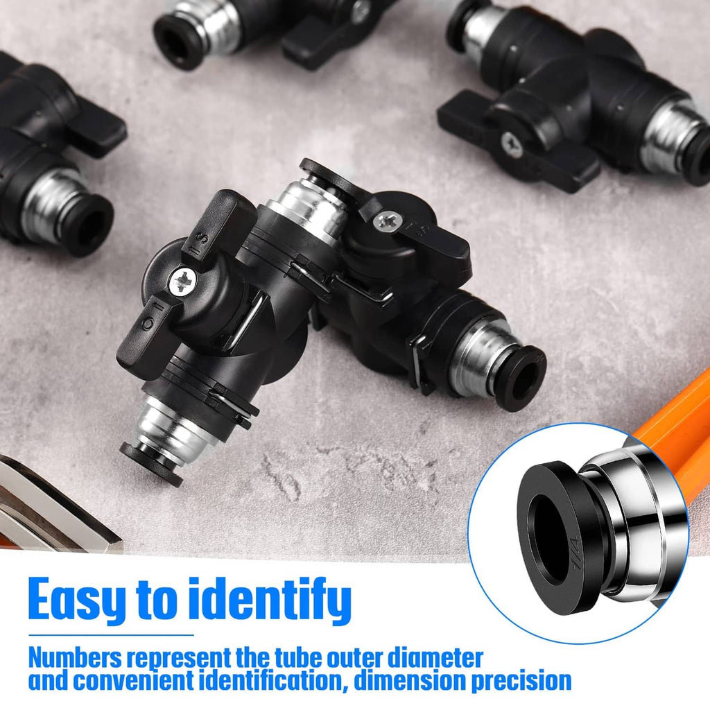 Black push-to-connect pneumatic air fittings, metal tube connections on top view