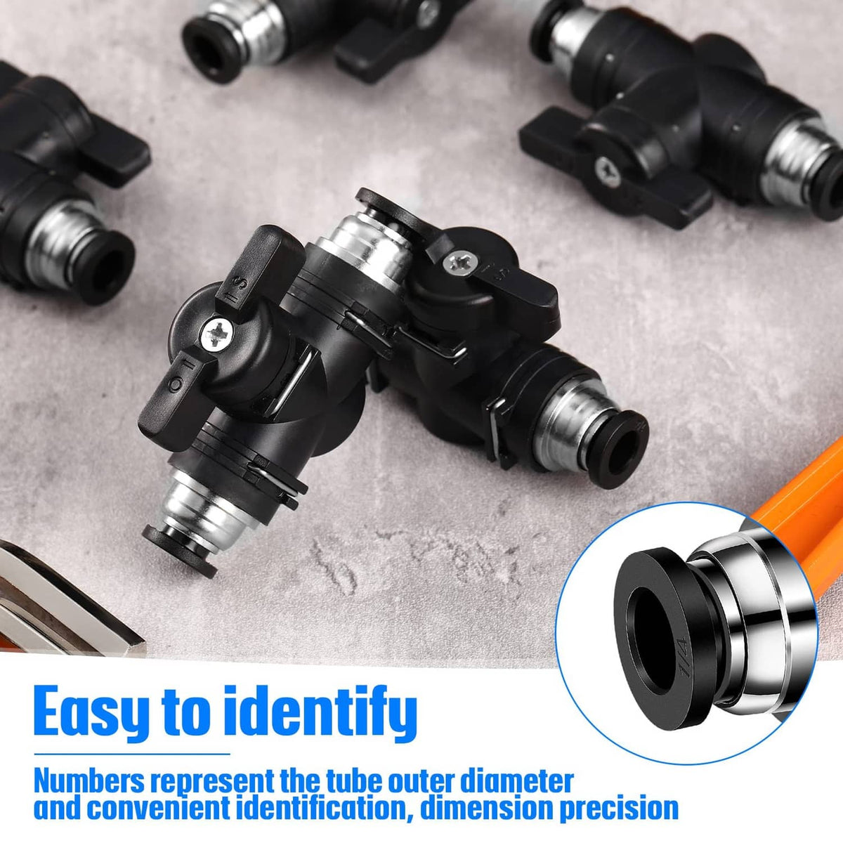 Black push-to-connect pneumatic air fittings, metal tube connections on top view