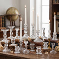 Clear glass taper candle holders set with multiple heights and ribbed bases
