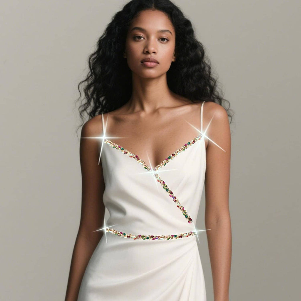 Multicolor crystal rhinestone trim chain on a white dress bodice and straps