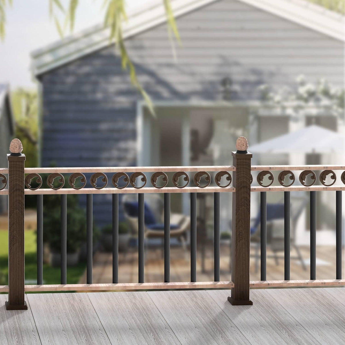 Matte black deck balusters with decorative top rail, mounted on deck railing posts